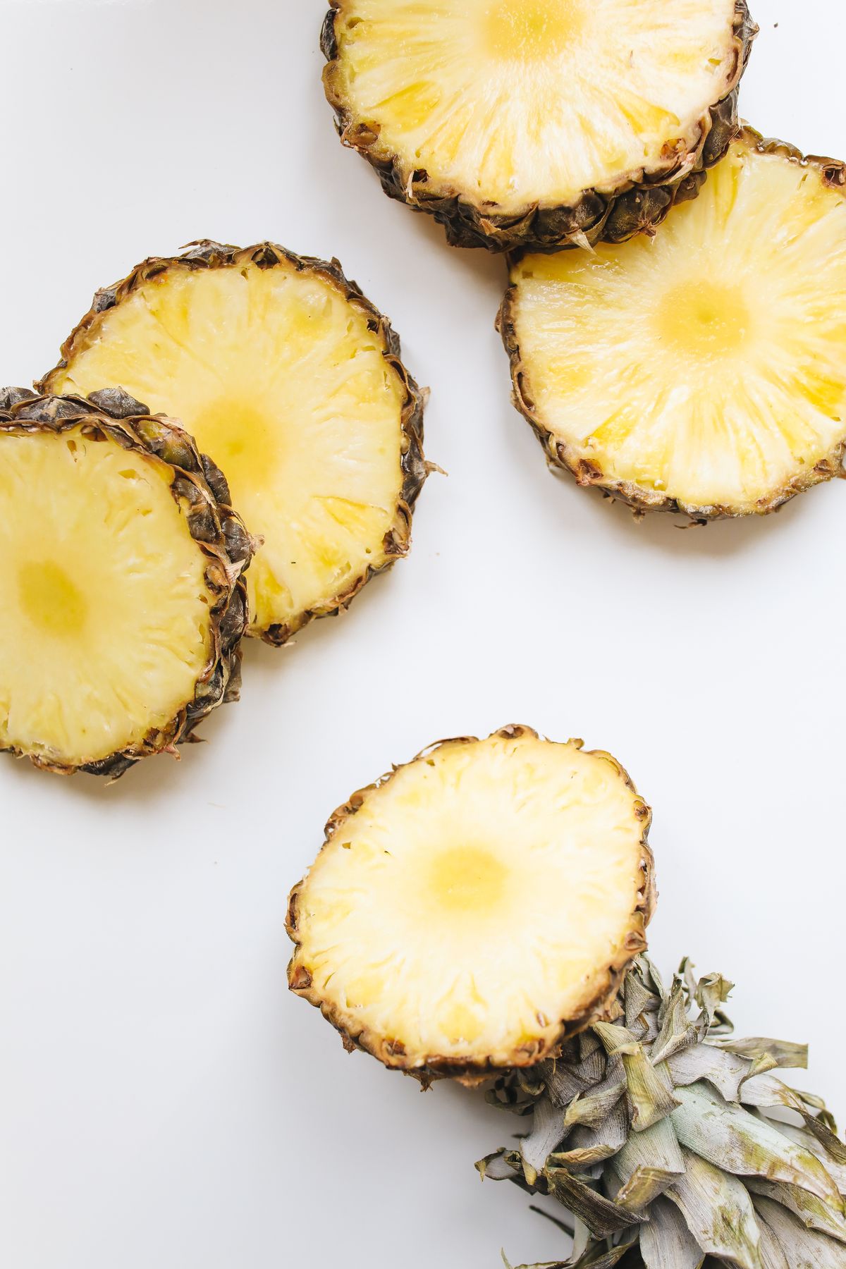 Fresh pineapple pieces photographed close up