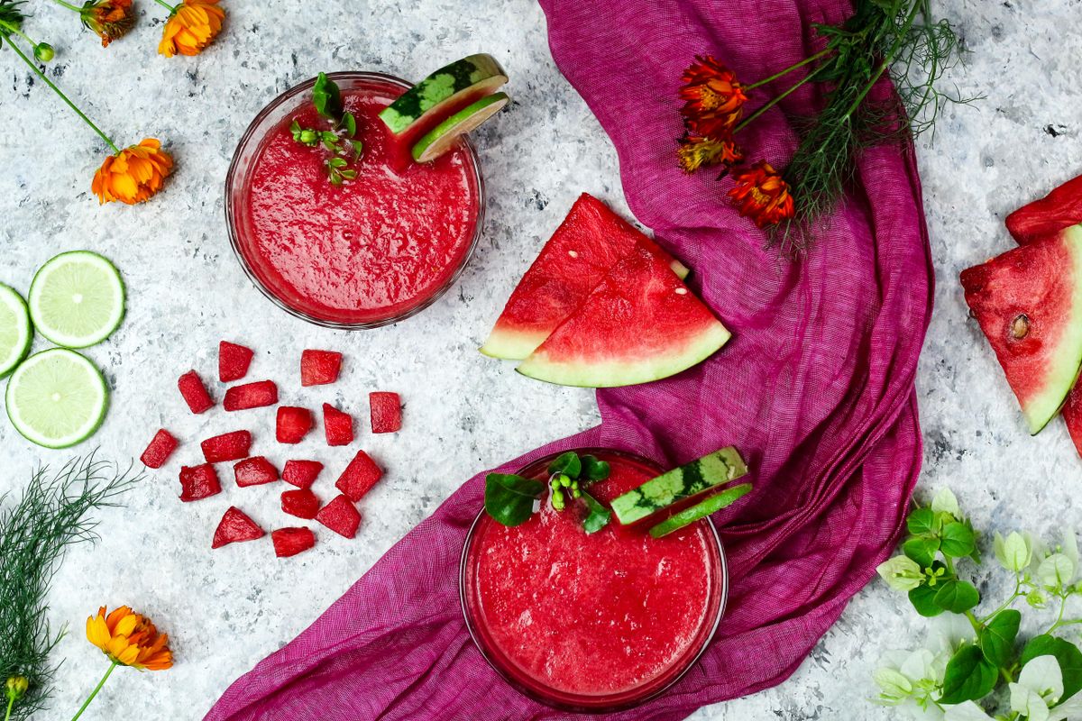 Watermelon drink with watermelon and lime slices